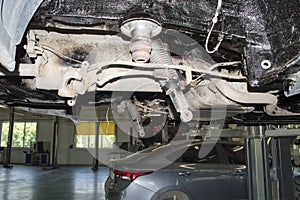 View of the partially disassembled rear suspension of the car