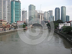 View of the Pasig river from a bridge, Makati city, Philippines photo