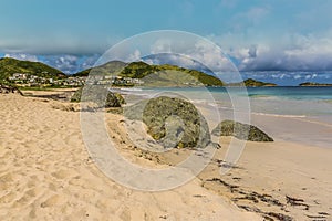 A view past large boulders along Orient beach in St Martin