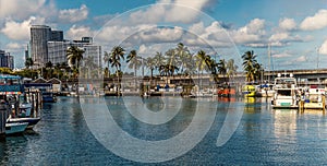 A view past the marina towards the port of Miami bridge in Miami