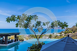 A view past a pool over the resort of Tamarindo in Costa Rica