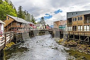 A view past stilted buildings down the Creek in Ketchikan, Alaska