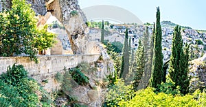 A view past the tenth-century church of San Michele along the ravine in Gravina, Puglia, Italy