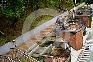 view of the path leading to the river in the city park.