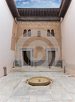 View at the Patio entrance hall to the Nasrid Palaces on fortress complex of the Alhambra citadel, tourist people visiting photo