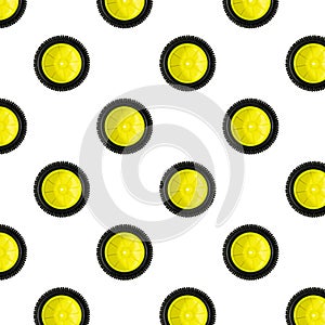 View pattern of mini size yellow plast wheel with black tire isolated on white background. Radio controlled cars concept.