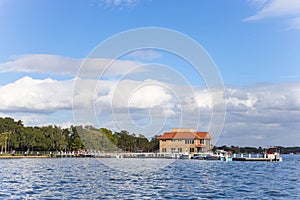 View of Pavilion at lake Dora across the water, Tavares, Florida, USA photo