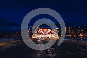 Night Sky Over An Illuminated Peace Bridge