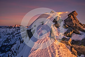 View of peak of Rysy in High Tatras during winter evening photo