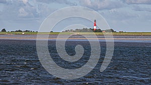 View of the Pellworm lighthouse from the Watt