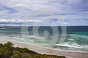 The view of Pennington Bay with coastal bush, beach, sea and surf on Kangaroo Island in South Australia, Australia.