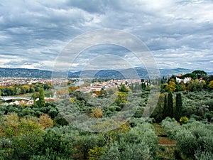View from Piazzale Michelangelo to the Botanical Garden Giardino dell`Iris, Arno river and hills photo