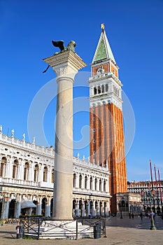 View of Piazzetta San Marco with St Mark`s Campanile, Lion of Venice statue and Biblioteca in Venice, Italy photo