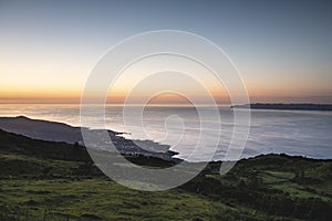 View on the Pico-Sao Jorge channel and Sao Roque after sunset as seen from the central plateau on Pico Island