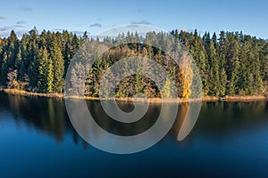 View on picturesque bank of lake in autumn morning, Lake Bolduk