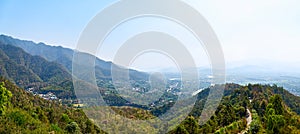 View of picturesque haze valley of the Kok River and Thai border town of Tha Ton