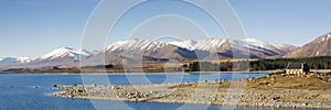 View on picturesque Lake Tekapo with its special blue color. Lake Tekapo is on the South Island of New Zealand