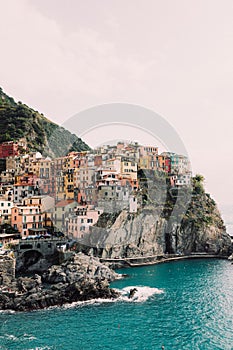 View of picturesque Manarola town on the seashore, Five Lands, Italy
