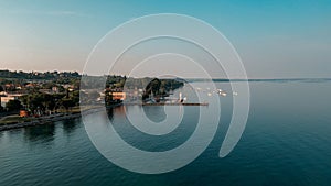 View of the picturesque town of Bardolino located by Lake Garda in Italy, on a sunny day