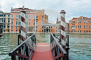 View of the pier and of the Grand Canal in Venice, Italy