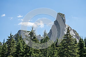 View of Pietrele Doamnei mountain Lady`s stones cliff from the valley. Rarau mountains in Bucovina,  Romania