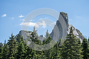 View of Pietrele Doamnei mountain Lady`s stones cliff from the valley. Rarau mountains in Bucovina,  Romania