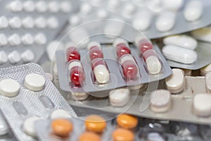 View of a pile of medical pills. Multiple drugs