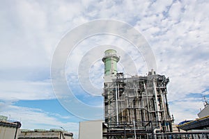 View of pipelines and towers, heavy industry.