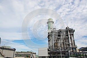 View of pipelines and towers, heavy industry.