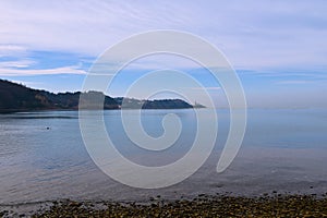 View of Piran peninsula from a beach at Strunjan