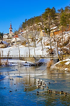 View of Pivka river near Postojna cave entrance at nice winter day Slovenia