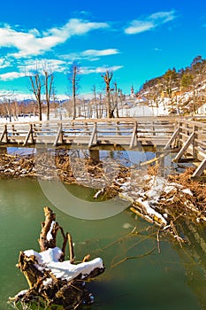 View of Pivka river near Postojna cave entrance at nice winter day Slovenia