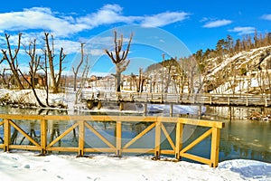 View of Pivka river near Postojna cave entrance at nice winter day Slovenia photo