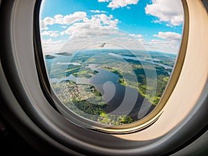 View of the planet Earth through the airplane porthole