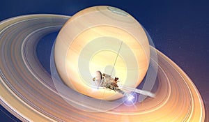 View of the planet Saturn with rings. Cassini probe in exploration around the planet. Solar system photo