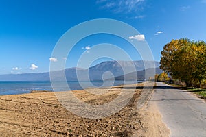 View of Pogradec Beach and mountains on the southern shores of Lake Ohrid in Albania