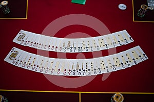 View On Poker Table With Cards And Chip s In LowLight