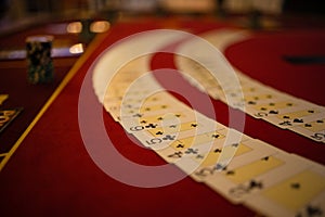 View On Poker Table With Cards And Chip s In LowLight