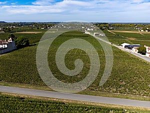 View on Pomerol village, production of red Bordeaux wine, Merlot or Cabernet Sauvignon red wine grapes on cru class vineyards in