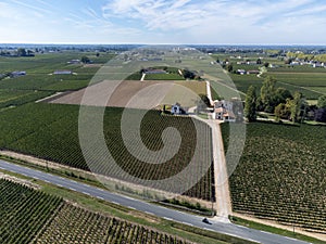 View on Pomerol village, production of red Bordeaux wine, Merlot or Cabernet Sauvignon red wine grapes on cru class vineyards in