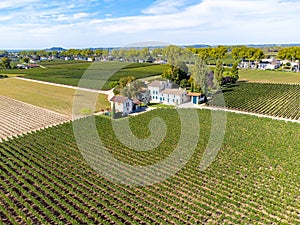 View on Pomerol village, production of red Bordeaux wine, Merlot or Cabernet Sauvignon red wine grapes on cru class vineyards in