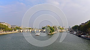 View of Pont Neuf arched stone bridge in Paris