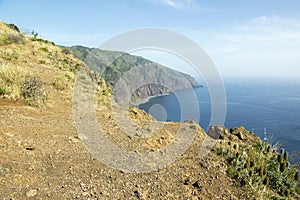 View from Ponta do Pargo view point, view over the cliff, amazing wild nature greenery, blue deep Atlantic ocean, Madeira island photo