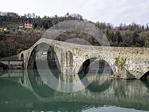 view of the Ponte della Maddalena or Ponte del Diavolo in Borgo a Mozzano Lucca. tuscany Italy