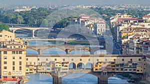 View on The Ponte Vecchio early morning timelapse, a medieval stone segmental arch bridge over the Arno River, in