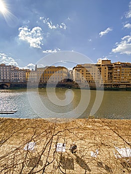 View from the Ponte Vecchio over the Arno river, in the Florence, Italy.