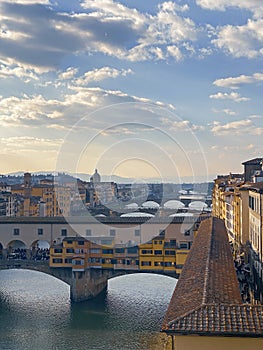 View from the Ponte Vecchio over the Arno river, in the Florence, Italy.