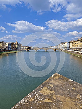 View from the Ponte Vecchio over the Arno river, in the Florence, Italy.