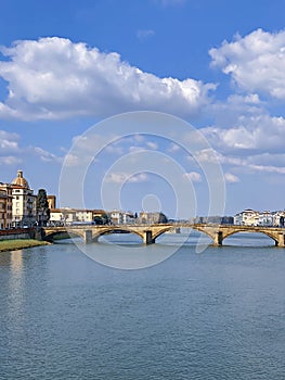 View from the Ponte Vecchio over the Arno river, in the Florence, Italy.