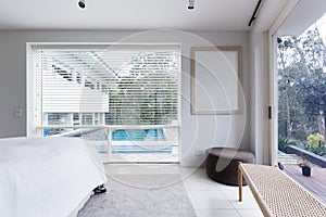 View of the pool from bedroom in luxury Australian home